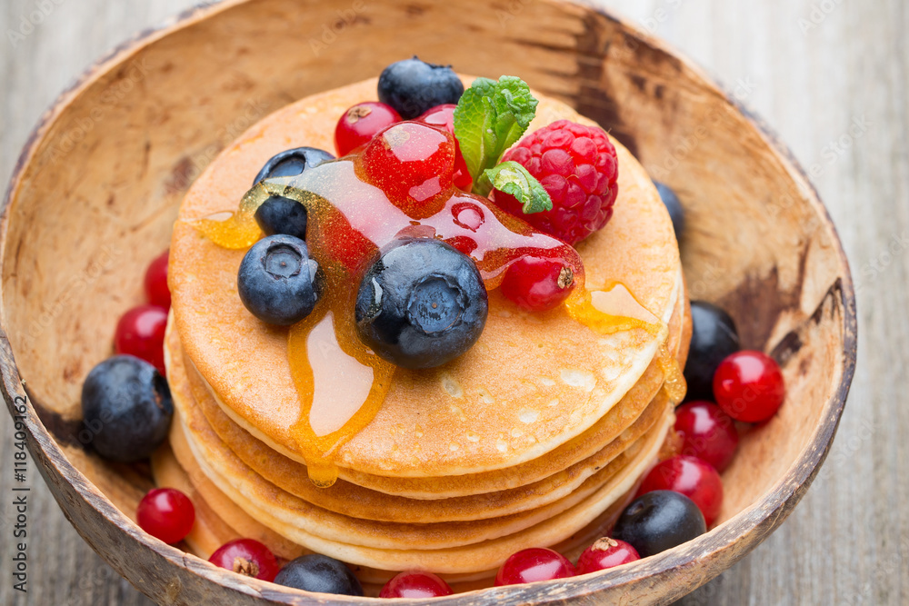Stack of pancakes with blueberry and fresh berry. Stack of pancakes with blueberry and fresh berry.