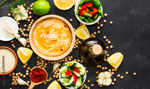 Wallpaper Mural Hummus on a black wooden background Torontodigital.ca