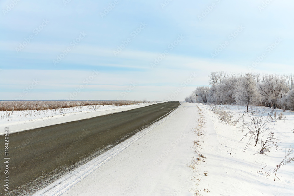 Obraz premium winter asphalt road 