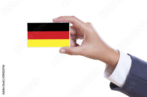Businessman holding a business card with German Flag 