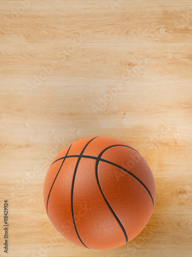 basketball ball on wooden floor with blank space