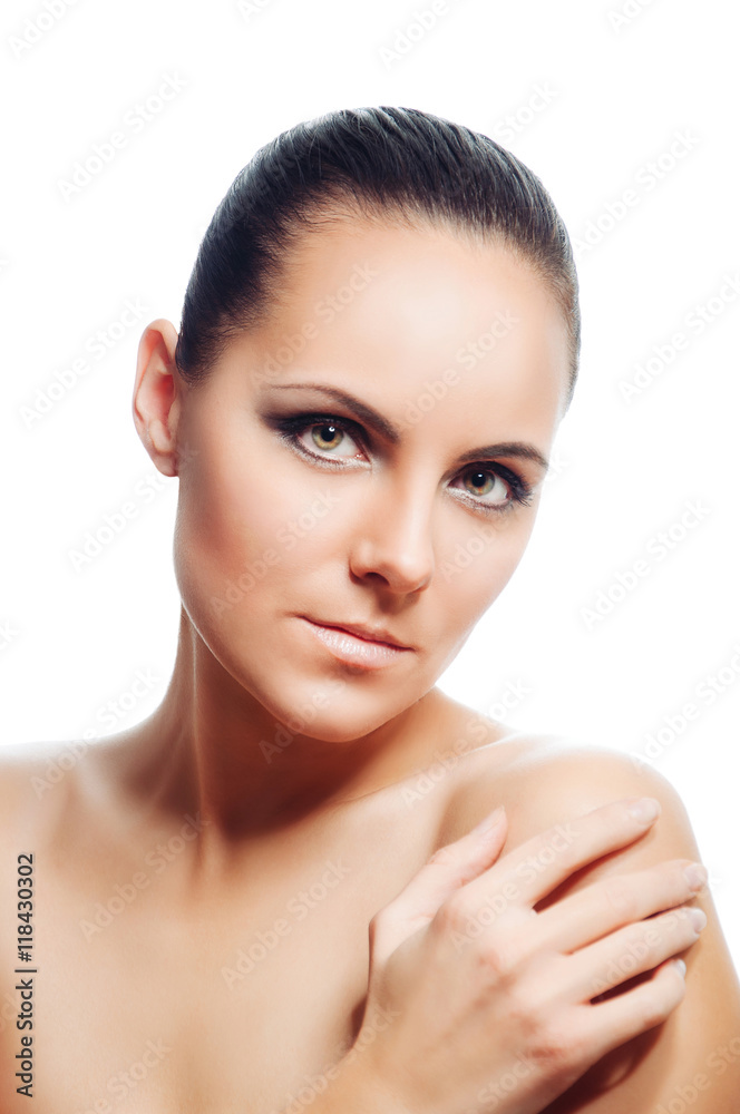 Beauty portrait of the lovely girl on a white background. Fashion make-up and care of skin.