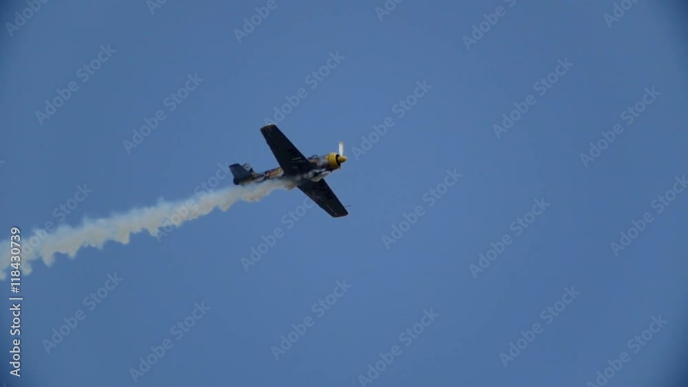 An old historical military soviet russia plane flying and performs aerobatics, slow motion An old historical military soviet russia plane flying and performs aerobatics, slow motion