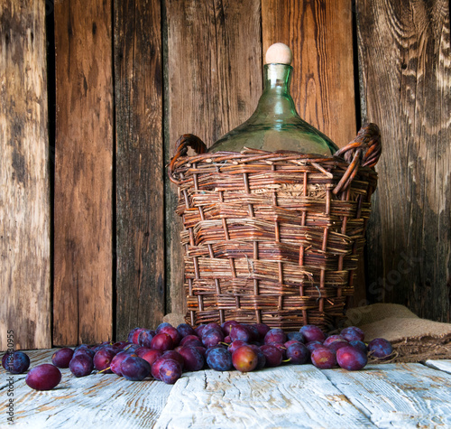 Obraz na płótnie Jug of homemade plum alcohol