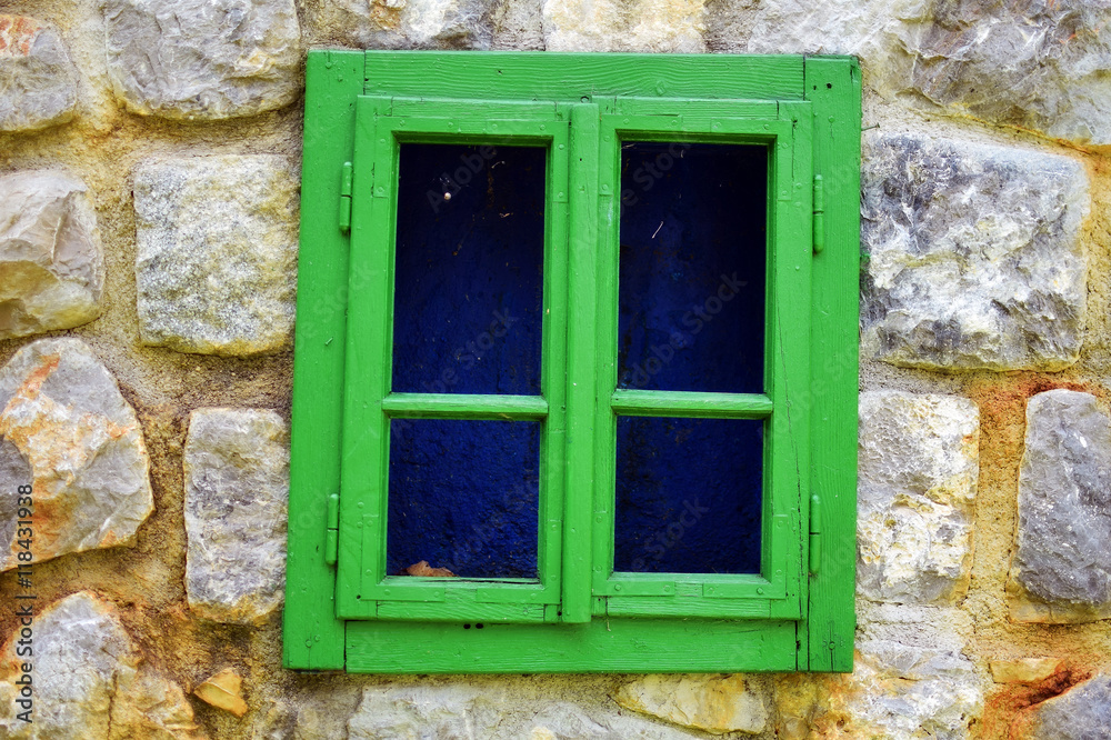 Old window. Wooden window and stone wall background Old window. Wooden window and stone wall background