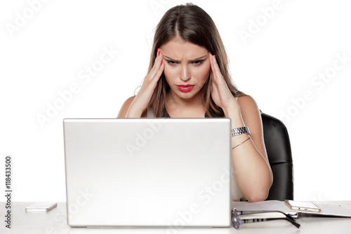 a young business woman with the laptop has a problem