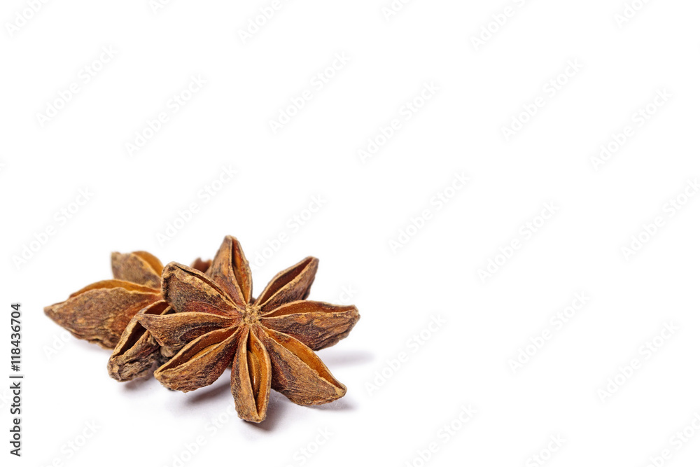 Fototapeta premium anise stars on a white background