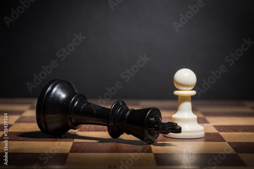 Картината върху платно Chess pieces set on a chessboard