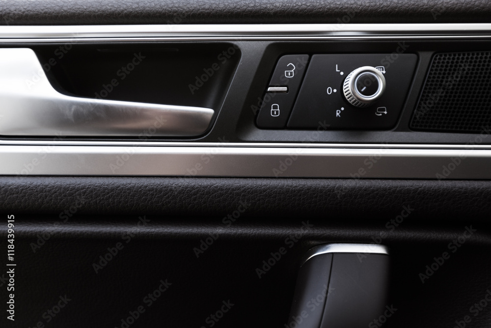 Inner door handle, modern car interior detail