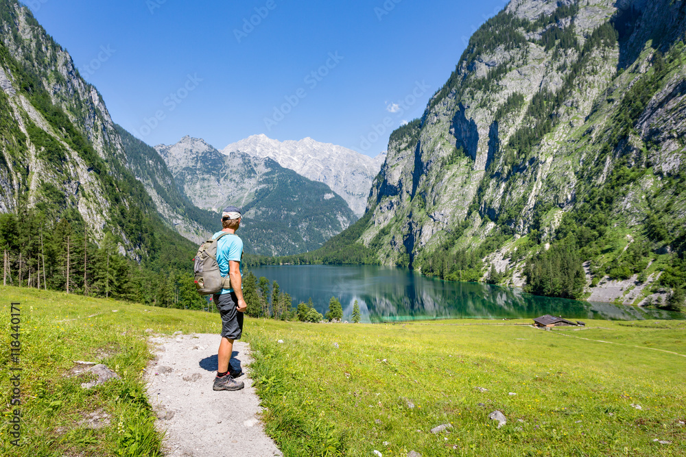 Hiking in the alps near Berchtesgaden at the Obersee, Koenigssee, Bavaria, Germany