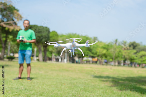 man play drone in park
