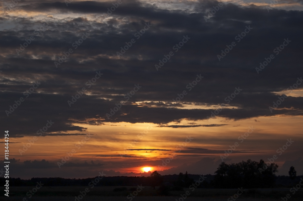 Clouds at sunset background