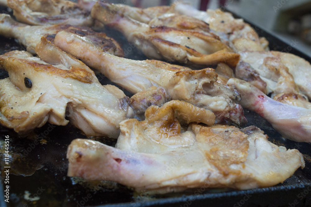 Chicken legs on grill