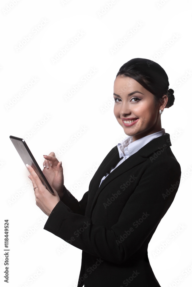 beautiful girl in a black business suit with tab standing on a w beautiful girl in a black business suit with tab standing on a w
