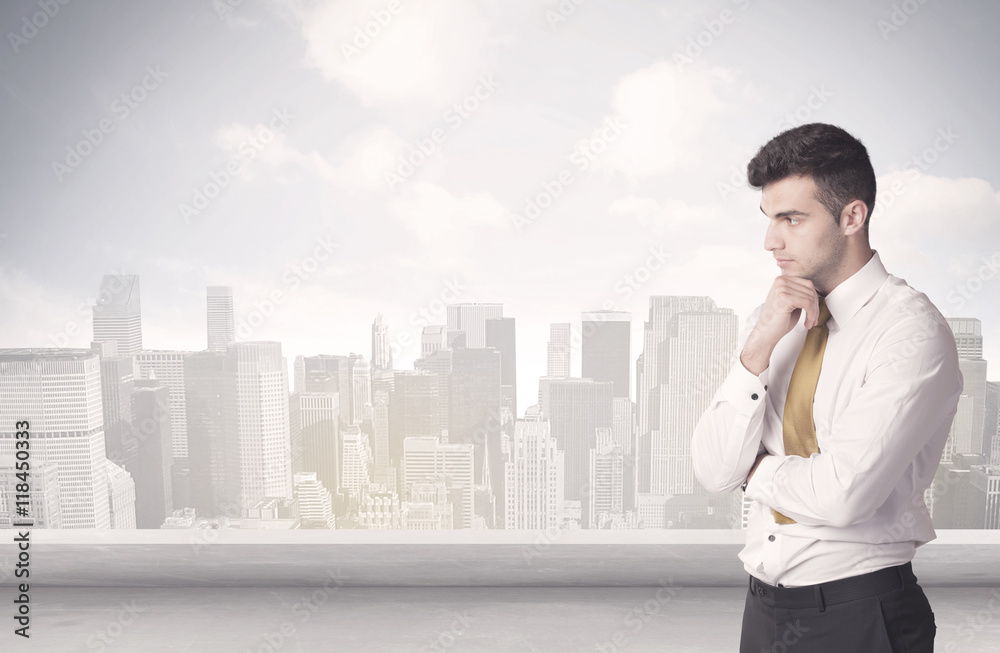 Sales person talking in front of city scape Sales person talking in front of city scape