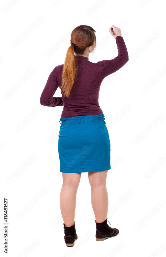 back view of writing beautiful woman. Young girl in dress. Rear view people collection. backside view of person. Isolated over white background. Girl with red hair tied in a pigtail draws felt-tip back view of writing beautiful woman. Young girl in dress. Rear view people collection. backside view of person. Isolated over white background. Girl with red hair tied in a pigtail draws felt-tip