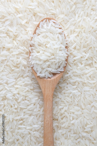 Jasmine rice and wooden spoon