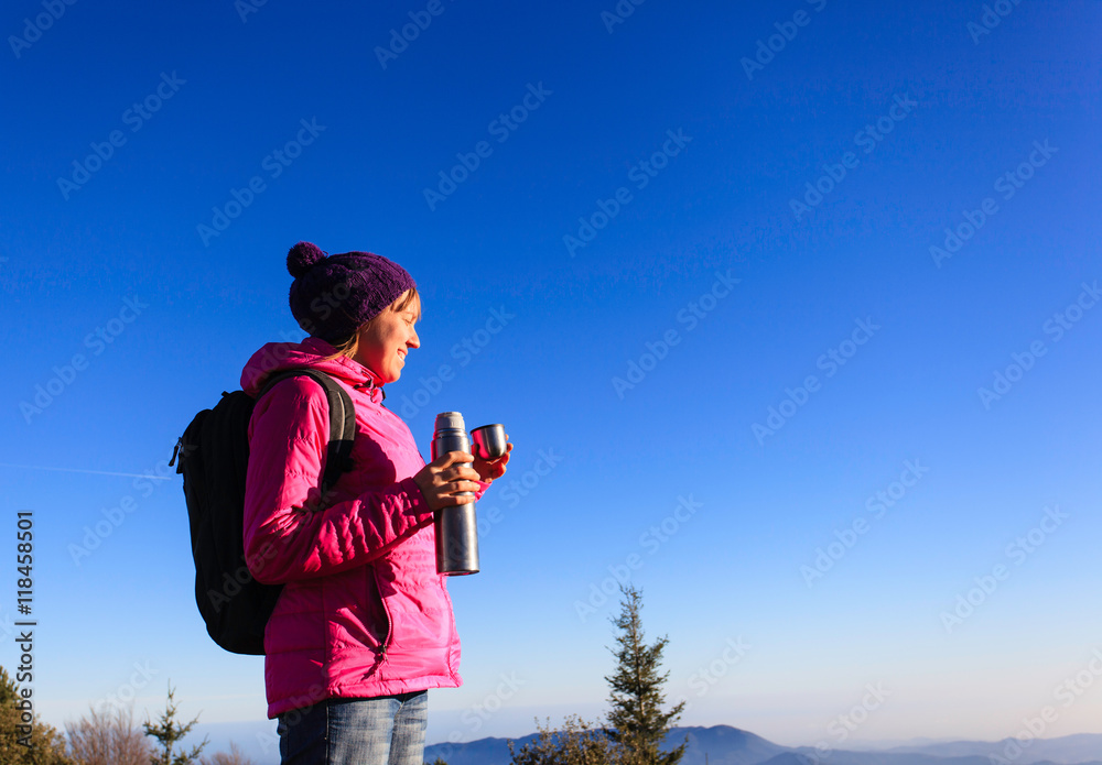young woman travel in winter mountains - obrazy, fototapety, plakaty 