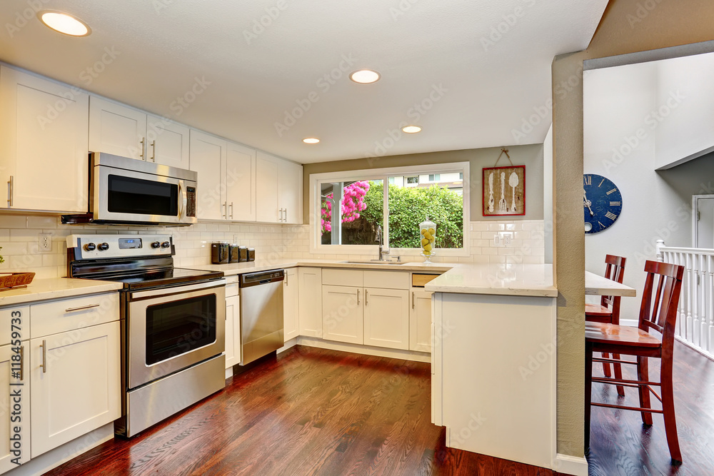 White kitchen room interior With hardwood floor. White kitchen room interior With hardwood floor.