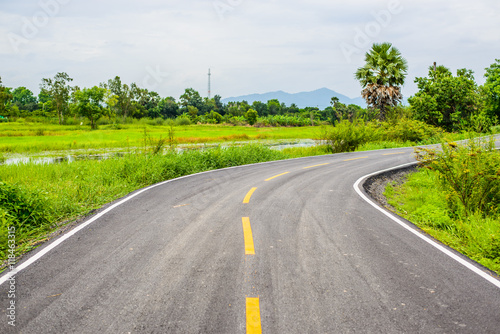 Asphalt road on countryside in thailand.