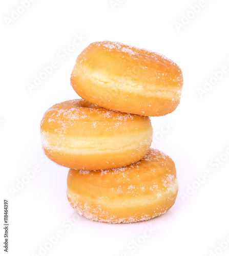 Three stacked sugared donuts over white background