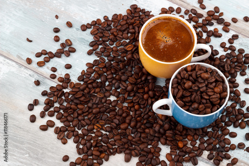 Coffee cup with roasted beans