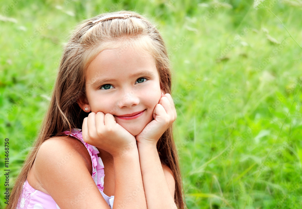 Portrait of adorable smiling little girl in summer day Portrait of adorable smiling little girl in summer day