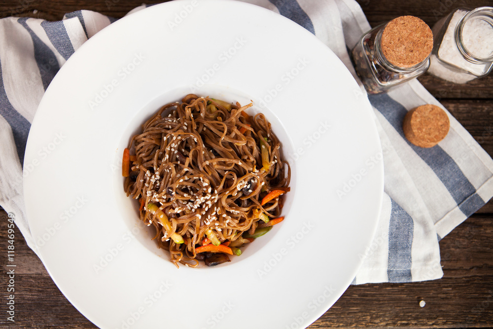 Tasty Soba noodles with vegetables in sweet and sour sauce on ol Tasty Soba noodles with vegetables in sweet and sour sauce on ol