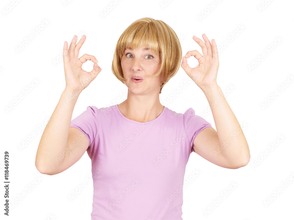 Beautiful happy young woman showing Ok sign isolated on backgrou