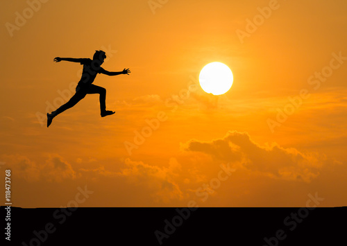 Silhouette of man jumping 