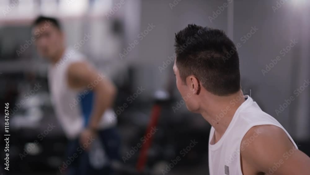 Portrait of man taking a break from training hard at the gym Portrait of man taking a break from training hard at the gym