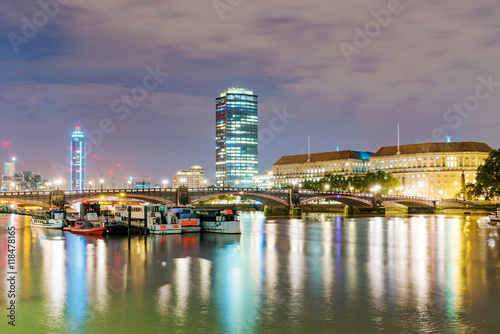 Buildings and boats at night © asiastock