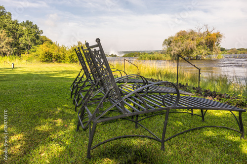 Deck Chairs set up on a sunny day along the banks of the Zambezi River in Zambia