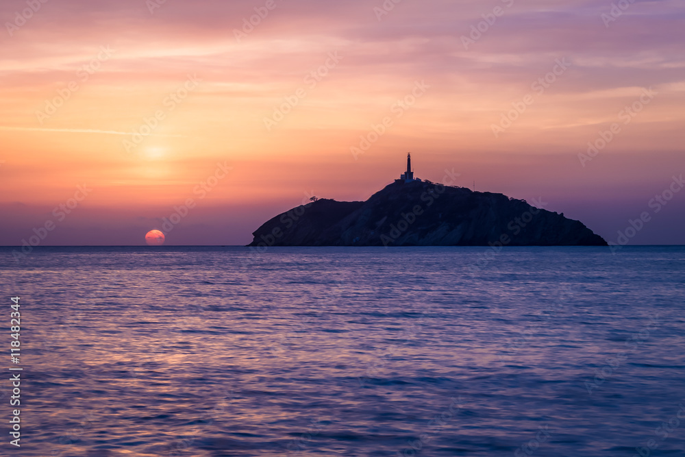Sunset view of a lighthouse in an island - Santa Marta, Colombia Sunset view of a lighthouse in an island - Santa Marta, Colombia