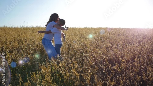 girl and the child are running towards each other