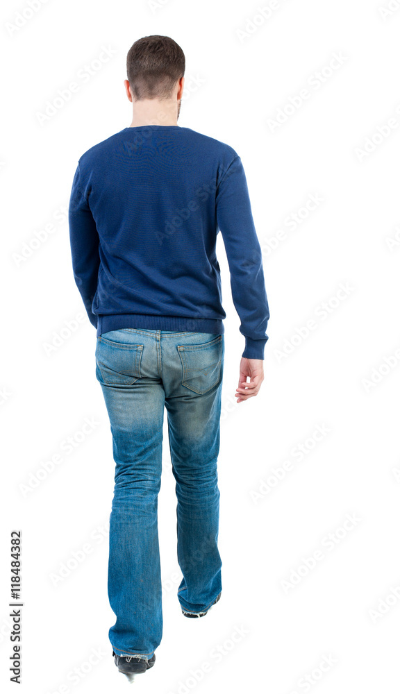 Back view of going handsome man. walking young guy . Rear view people collection. backside view of person. Isolated over white background. bearded man in blue pullover goes away. Back view of going handsome man. walking young guy . Rear view people collection. backside view of person. Isolated over white background. bearded man in blue pullover goes away.