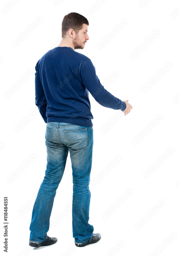 back view of businessman reaches out to shake hands. Rear view people collection. backside view of person. Isolated over white background. bearded man in blue pullover is preparing to shake hands. back view of businessman reaches out to shake hands. Rear view people collection. backside view of person. Isolated over white background. bearded man in blue pullover is preparing to shake hands.