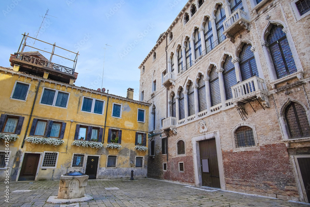 Venice, Italy, June, 21, 2016: facade of an ancient house in Venice, Italy