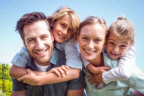 Happy parents with their children