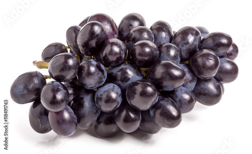 Bunch of blue grapes isolated on white background