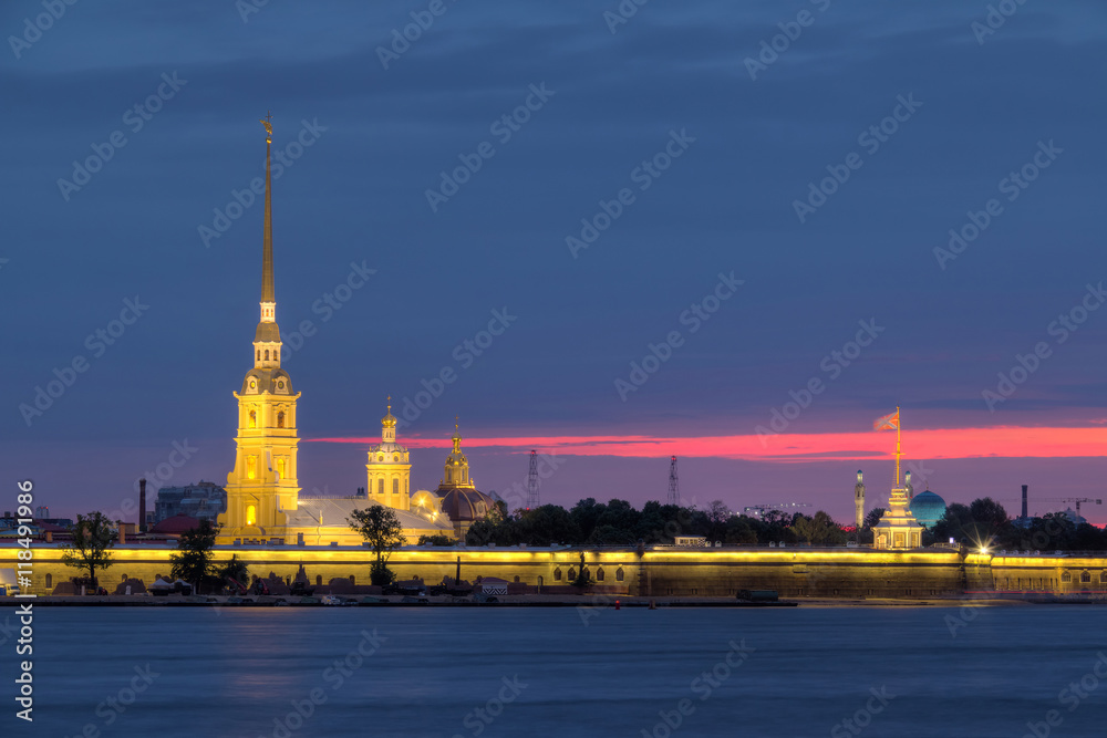 Night view on the illuminated Peter and Paul Fortress and Neva River, St. Petersburg, Russia.