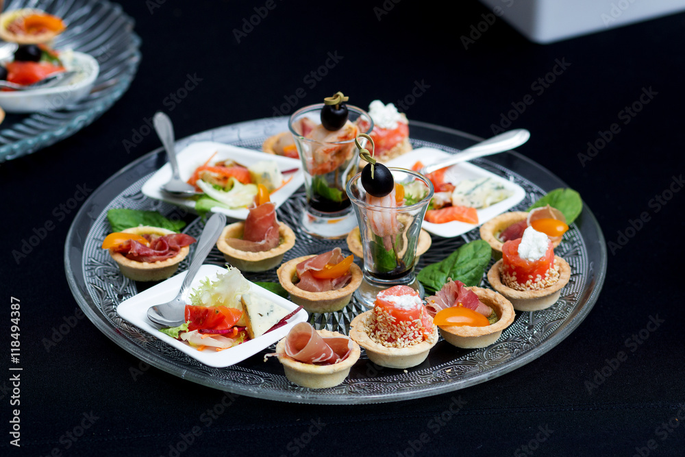 Rolls with salmon, next to edible pastry jamon. Rolls with salmon, next to edible pastry jamon.