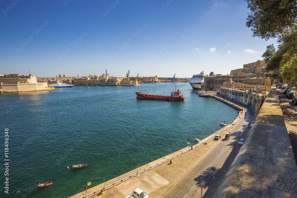Valletta, Malta - The Grand Harbour of Malta with ships and clea