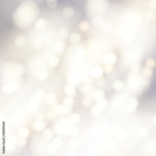 Vector bokeh background. Festive defocused white lights. Abstract blurred illustration.