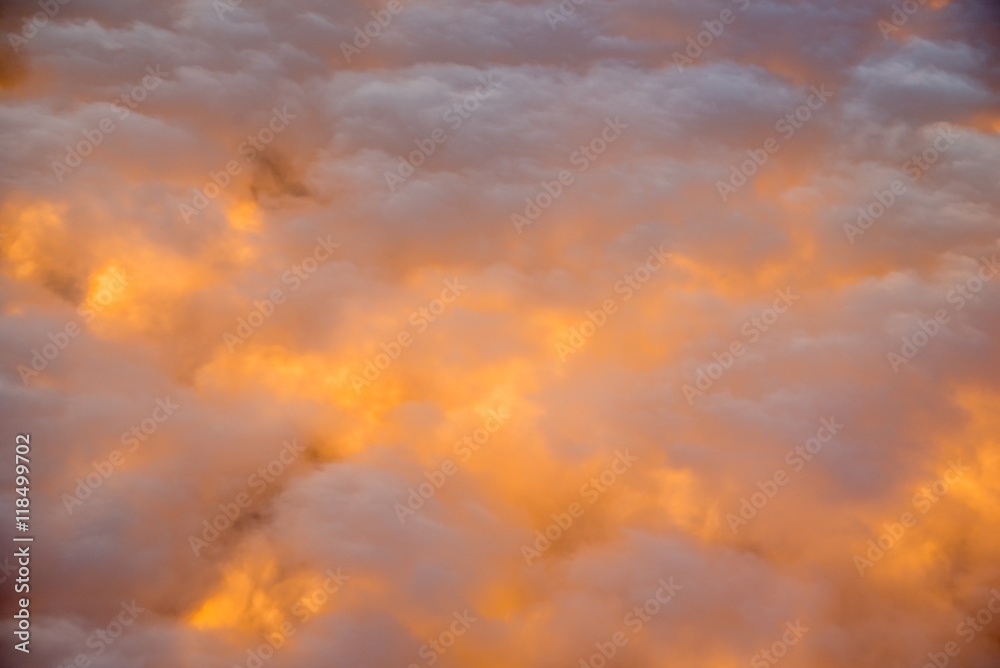 Clouds over sunset seen from airplane