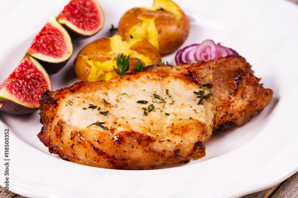 Roasted Pork Chop with Figs, Baked Potato, Red Onion and Thyme Roasted Pork Chop with Figs, Baked Potato, Red Onion and Thyme
