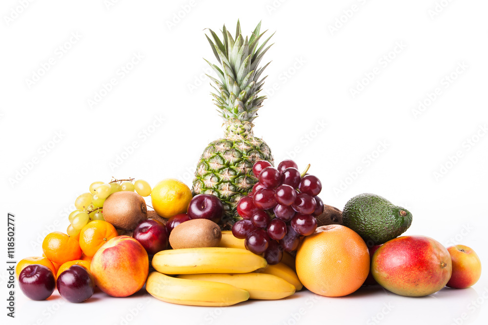 Fresh fruits. Assortment of exotic fruits isolated on white Fresh fruits. Assortment of exotic fruits isolated on white