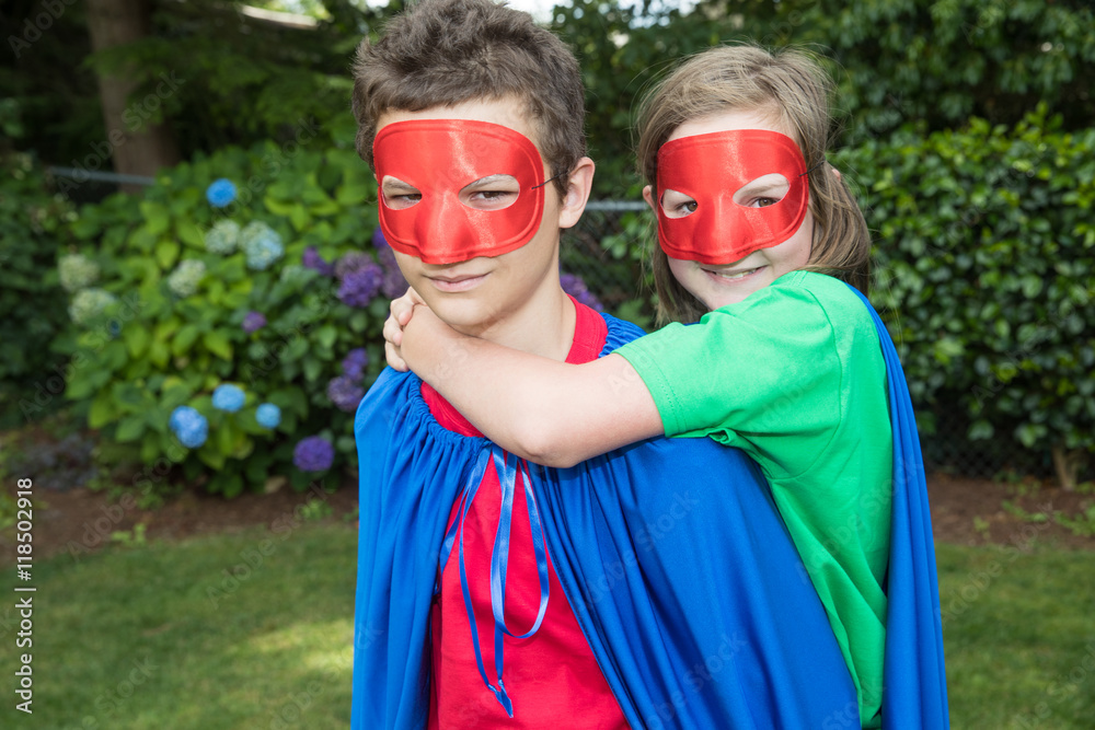 Obraz premium Superhero duo in cape and mask