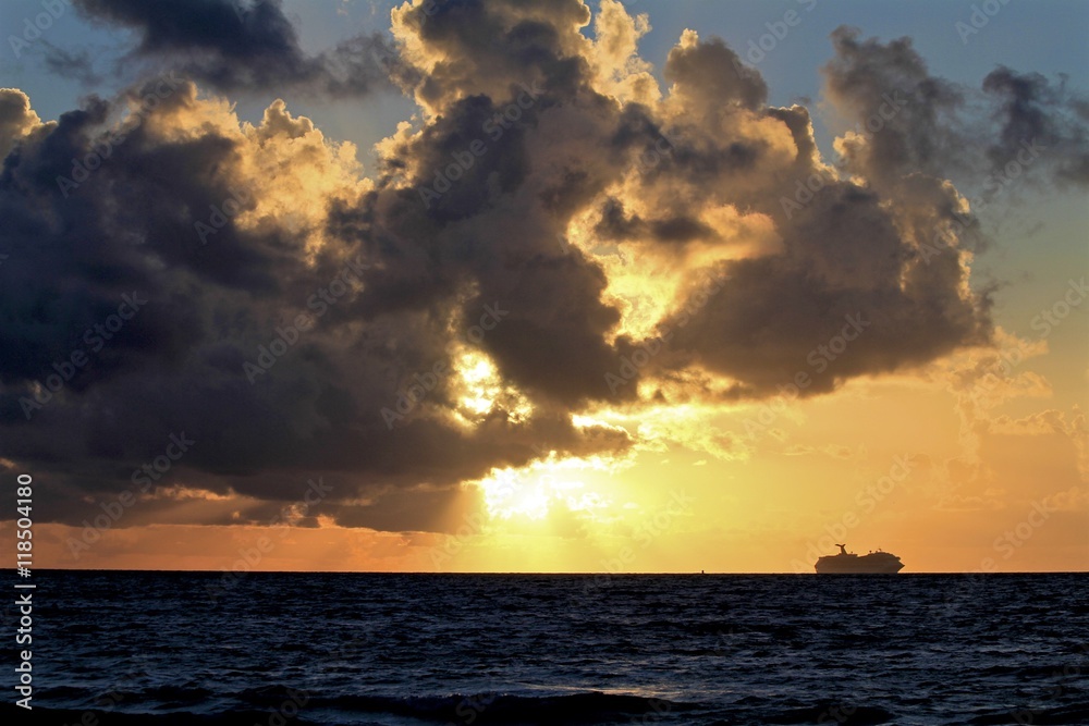 Sunrise at South Beach, cruise ship at the horizon Sunrise at South Beach, cruise ship at the horizon
