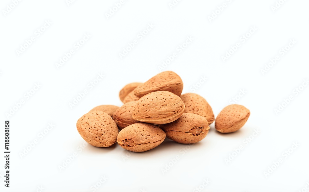 Almonds in shell on white background Almonds in shell on white background